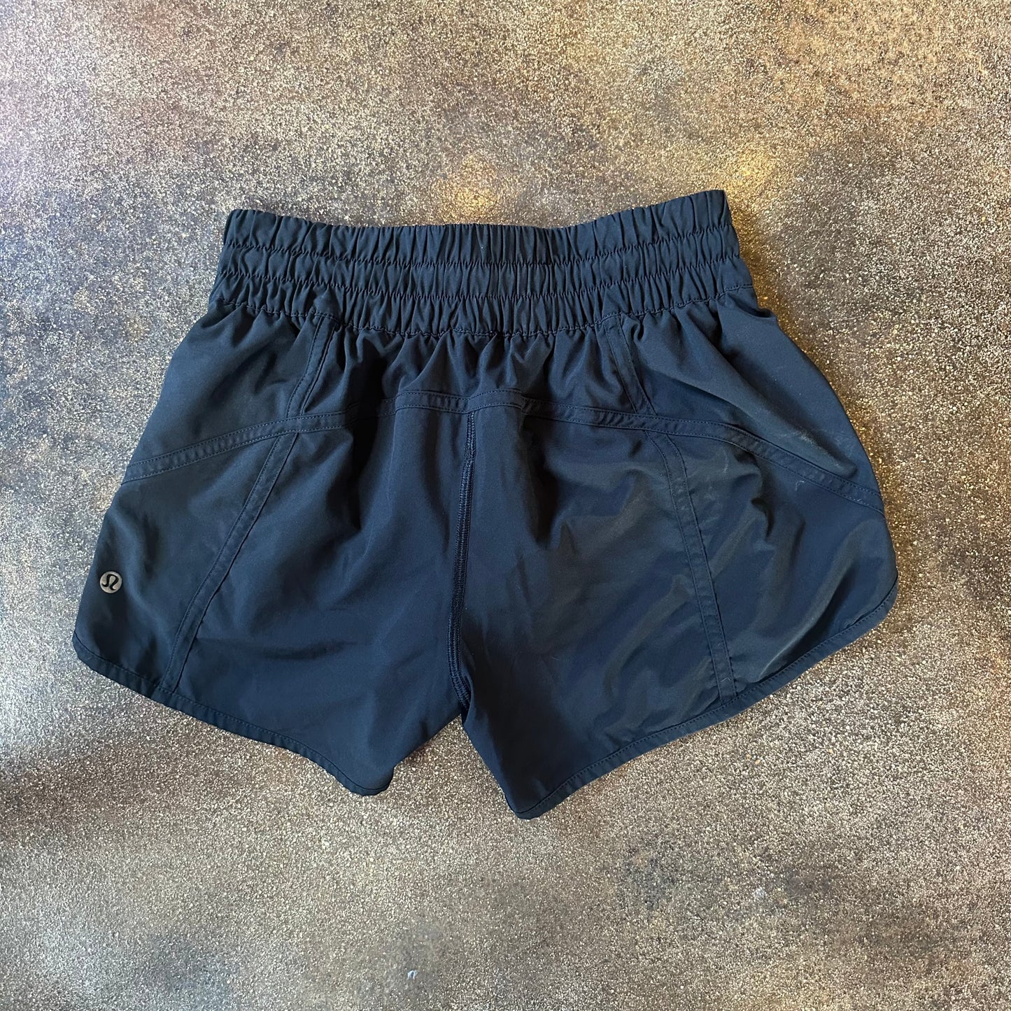 Size 6 Black Tracker Short 4” *logo wear