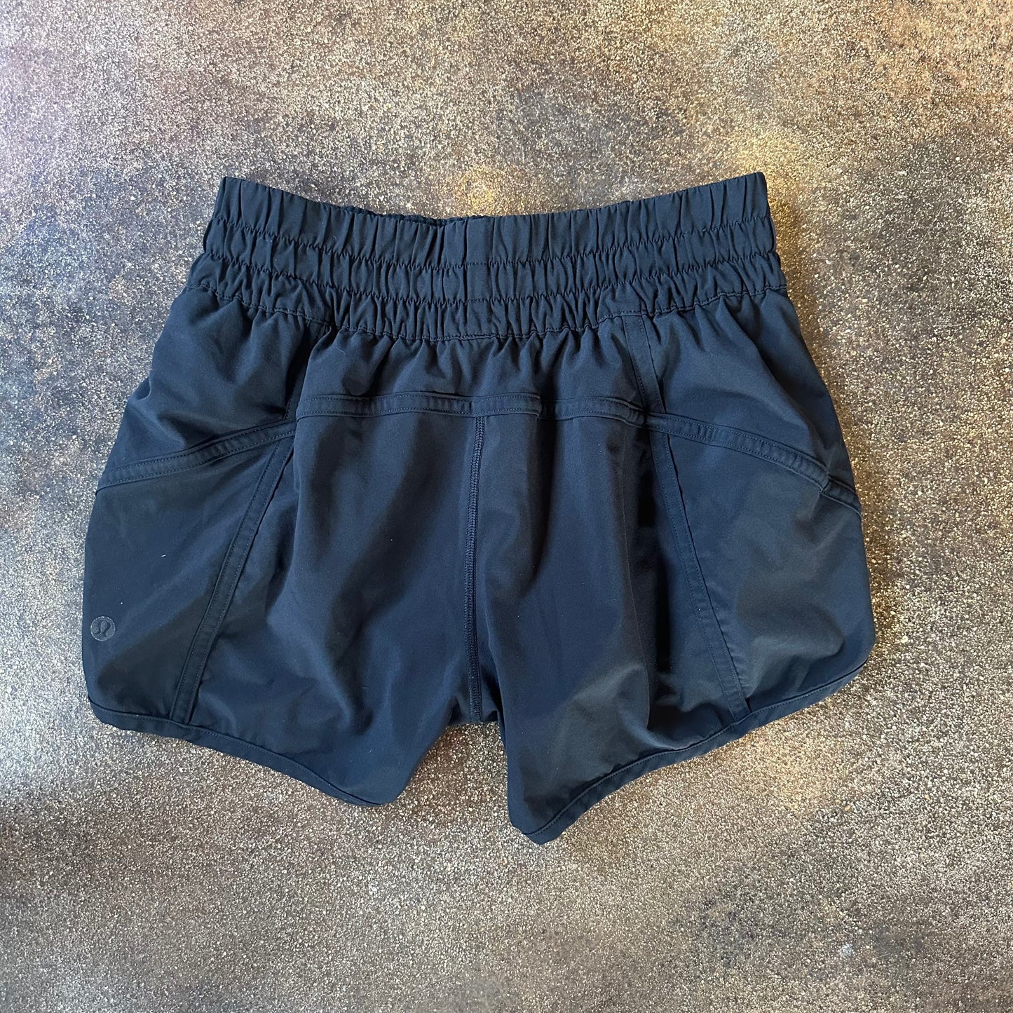 Size 6 Black Tracker Short 4” *logo wear