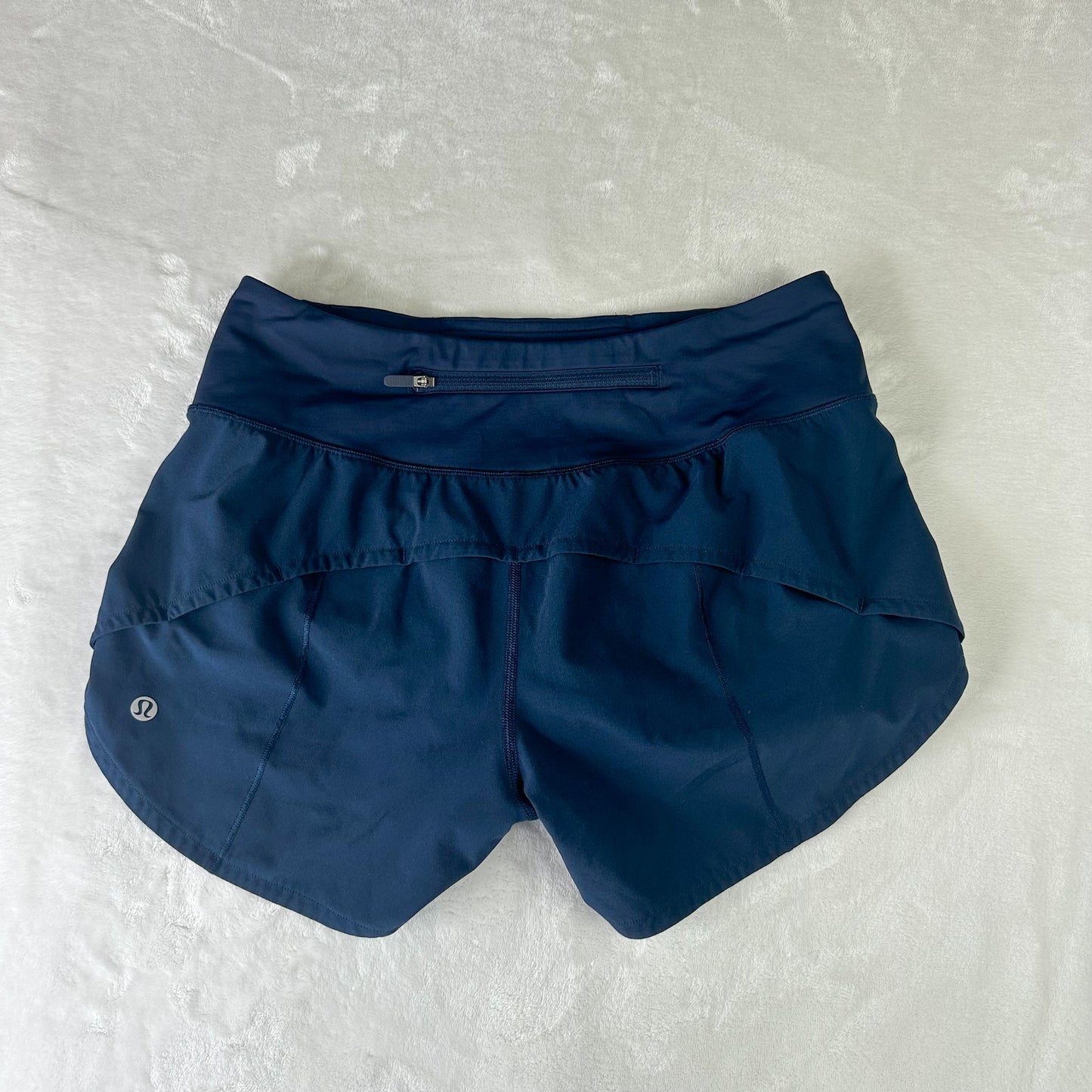 Size 4 True Navy Mid-Rise Speed Up Short 4”